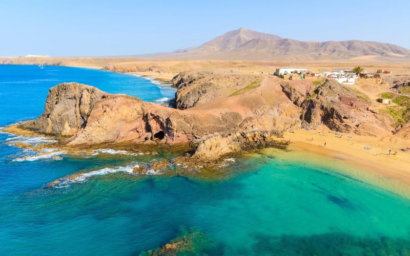 Aerial view of a rock pool on a volcanic coastline in the Canary Islands