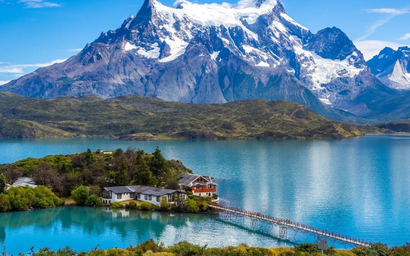 Torres del Paine granite towers reflected in Paine Lake at sunrise, Chilean Patagonia